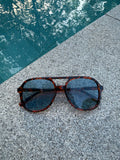 Zonnebril met blauwe glazen