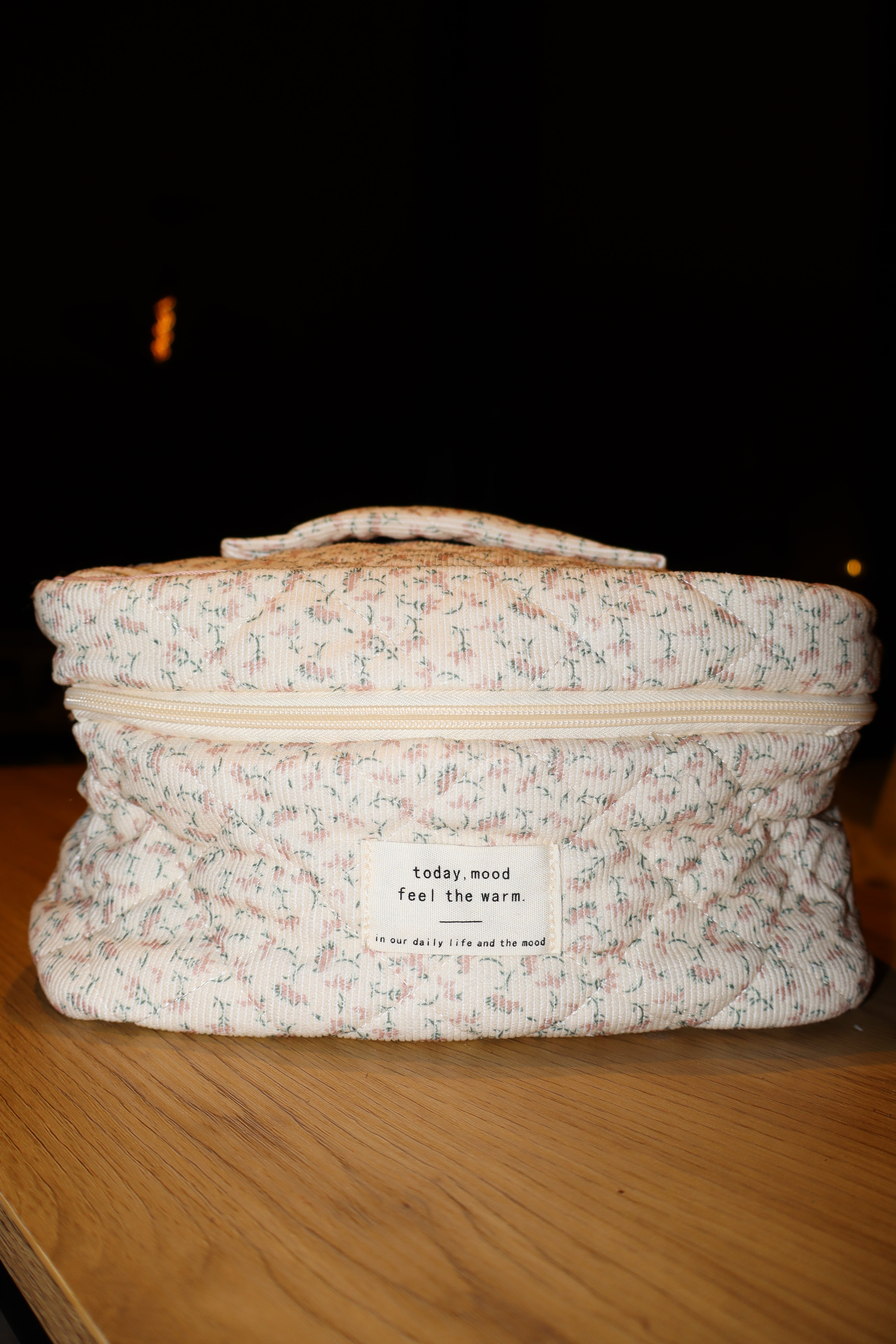 Toilettas met roze bloemenpatroon