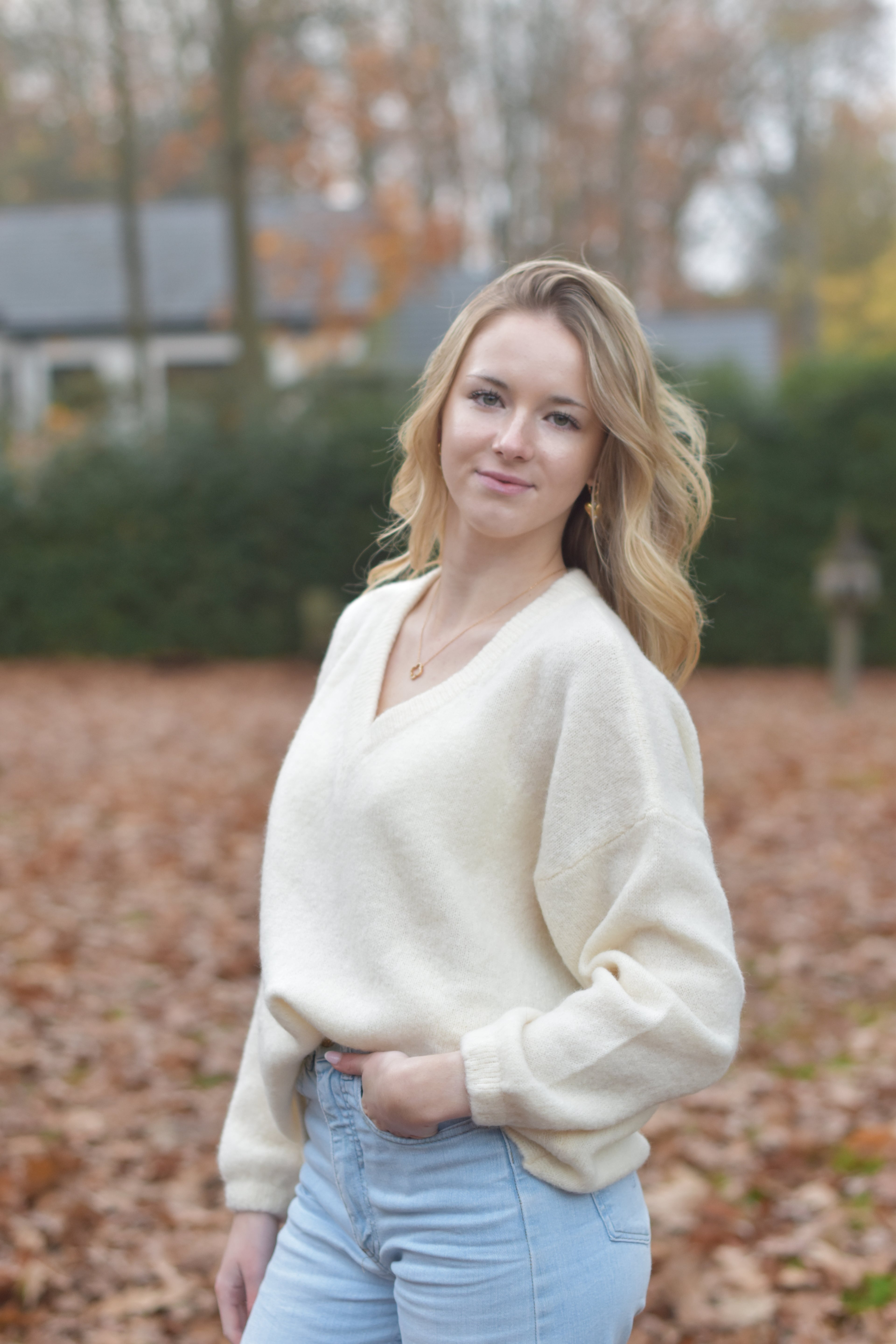 Witte trui met v-hals