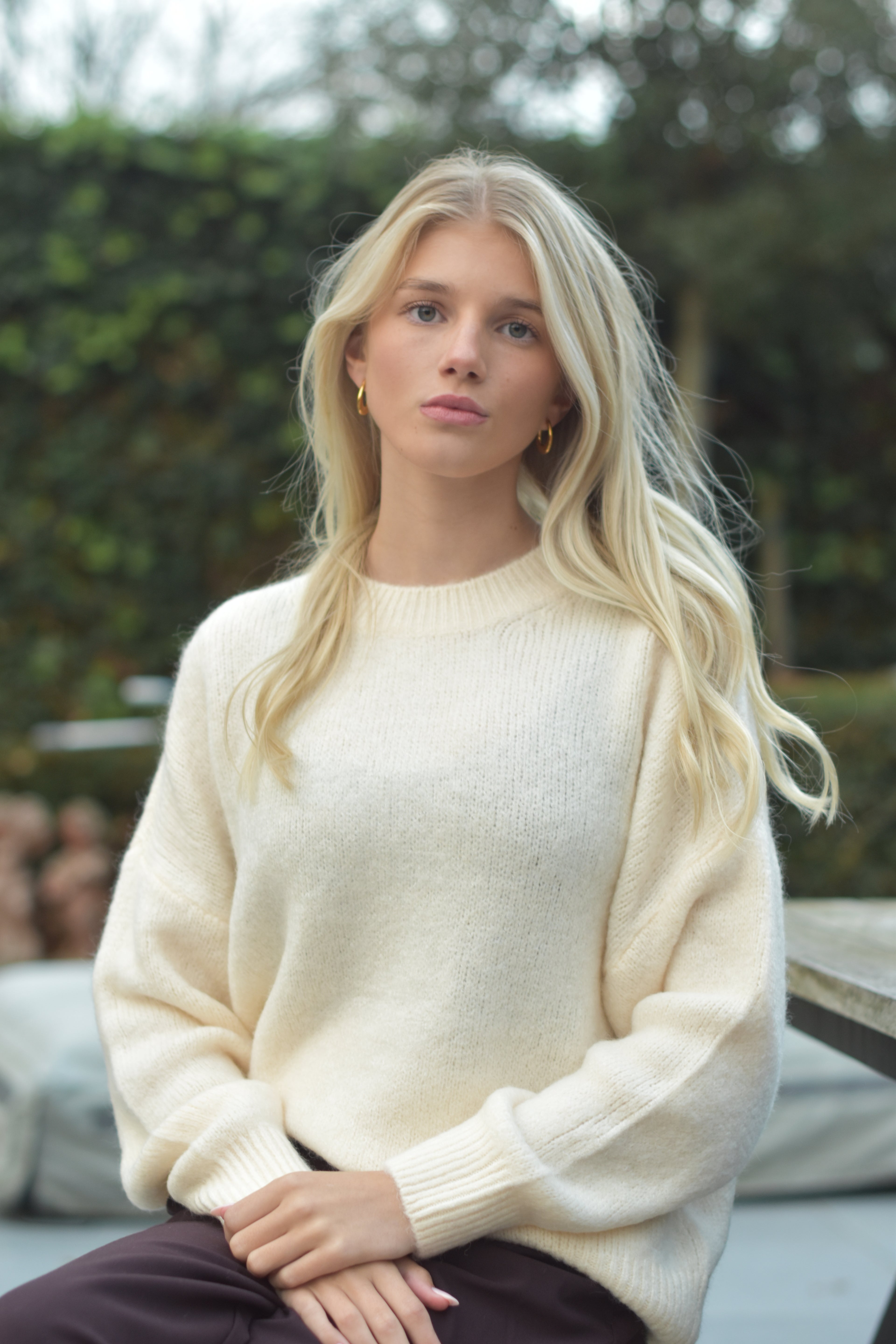 Witte trui met ronde hals